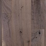 Walnut hardwood flooring with skip sawn and wire brush texture.