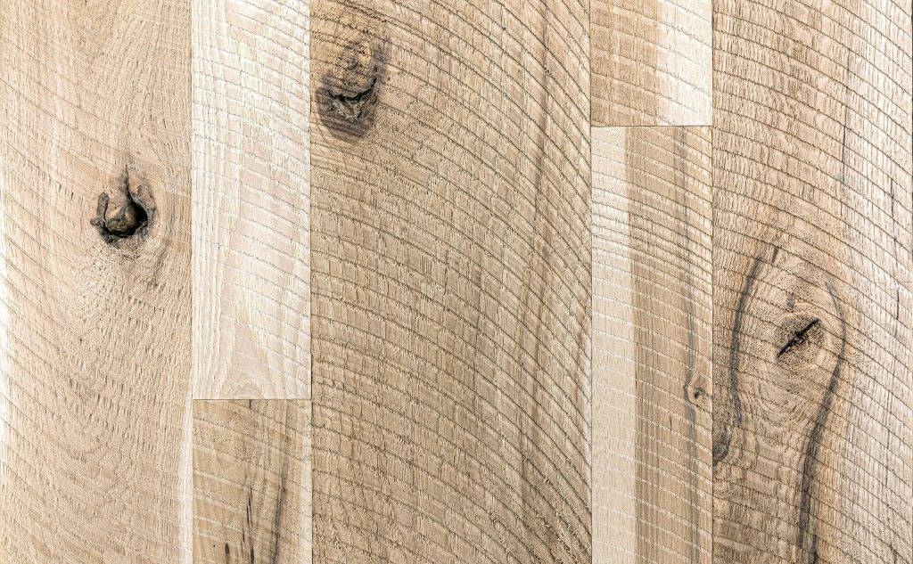 Hickory hardwood flooring with circle sawn texture.