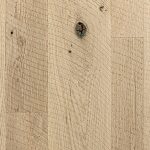 White oak hardwood flooring with circle sawn texture.