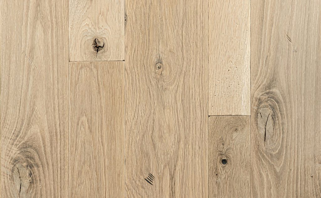 White oak hardwood flooring with distressed texture.
