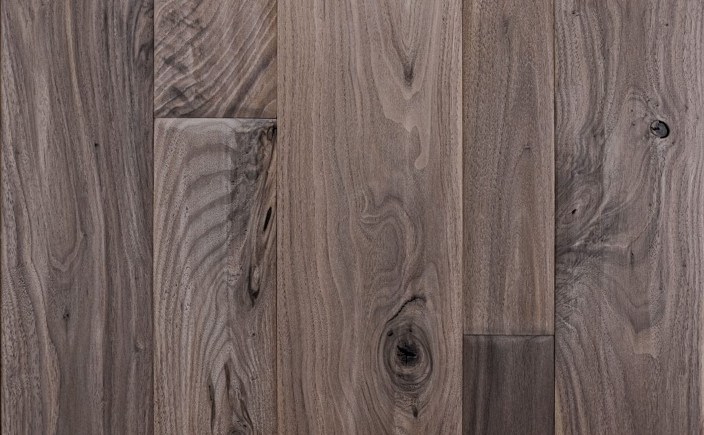Walnut hardwood flooring with hand scraped chalet texture.
