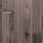 Walnut hardwood flooring with hand scraped chalet texture.