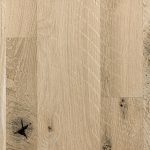 White oak hardwood flooring with skip sawn texture.