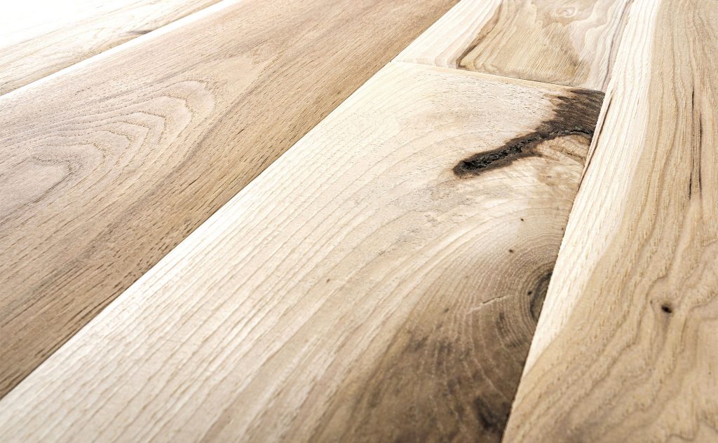 Hickory hardwood flooring with chalet texture close up.