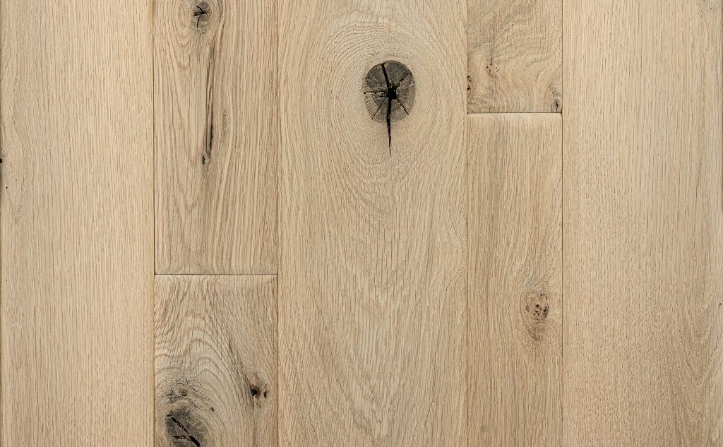 Smooth white oak hardwood flooring with chalet texture.