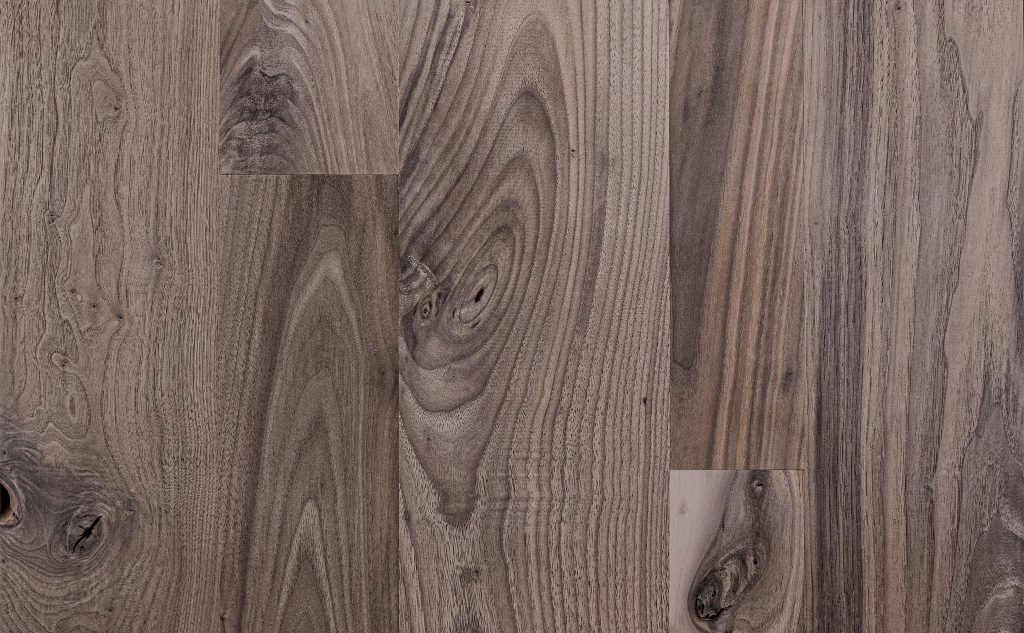 Smooth walnut hardwood flooring.