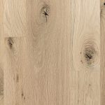 Smooth white oak hardwood flooring.