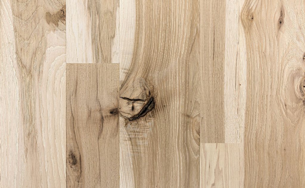 Hickory hardwood flooring with wire brushed texture.
