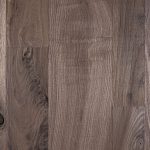 Walnut hardwood flooring with wire brush texture.